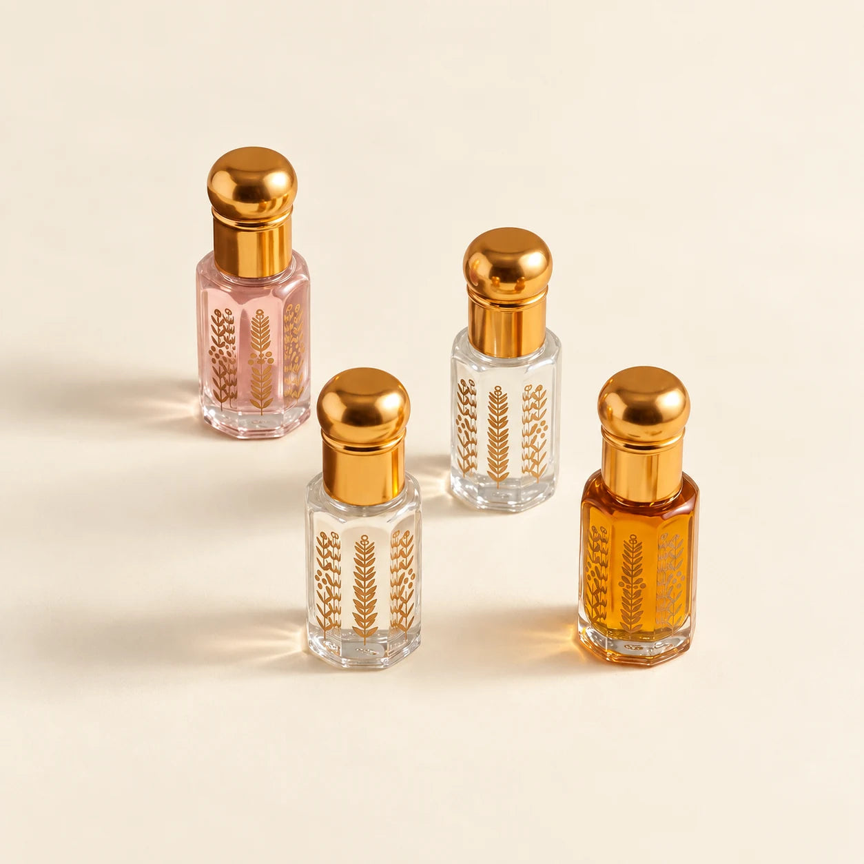 The four gold-capped roll-on bottles in the Best Sellers Bundle