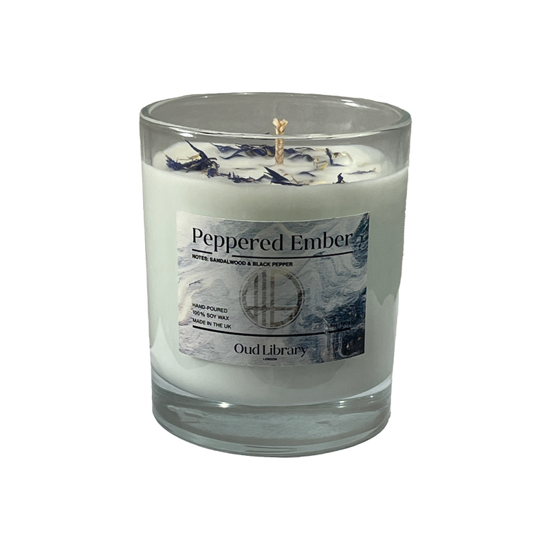 Peppered Ember soy wax candle in a glass jar by Oud Library